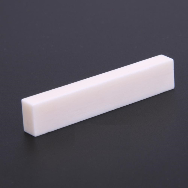 BNK-20 Заготовка верхнего порожка для гитары 56х11х6.5mm искуств. кость. Hosco